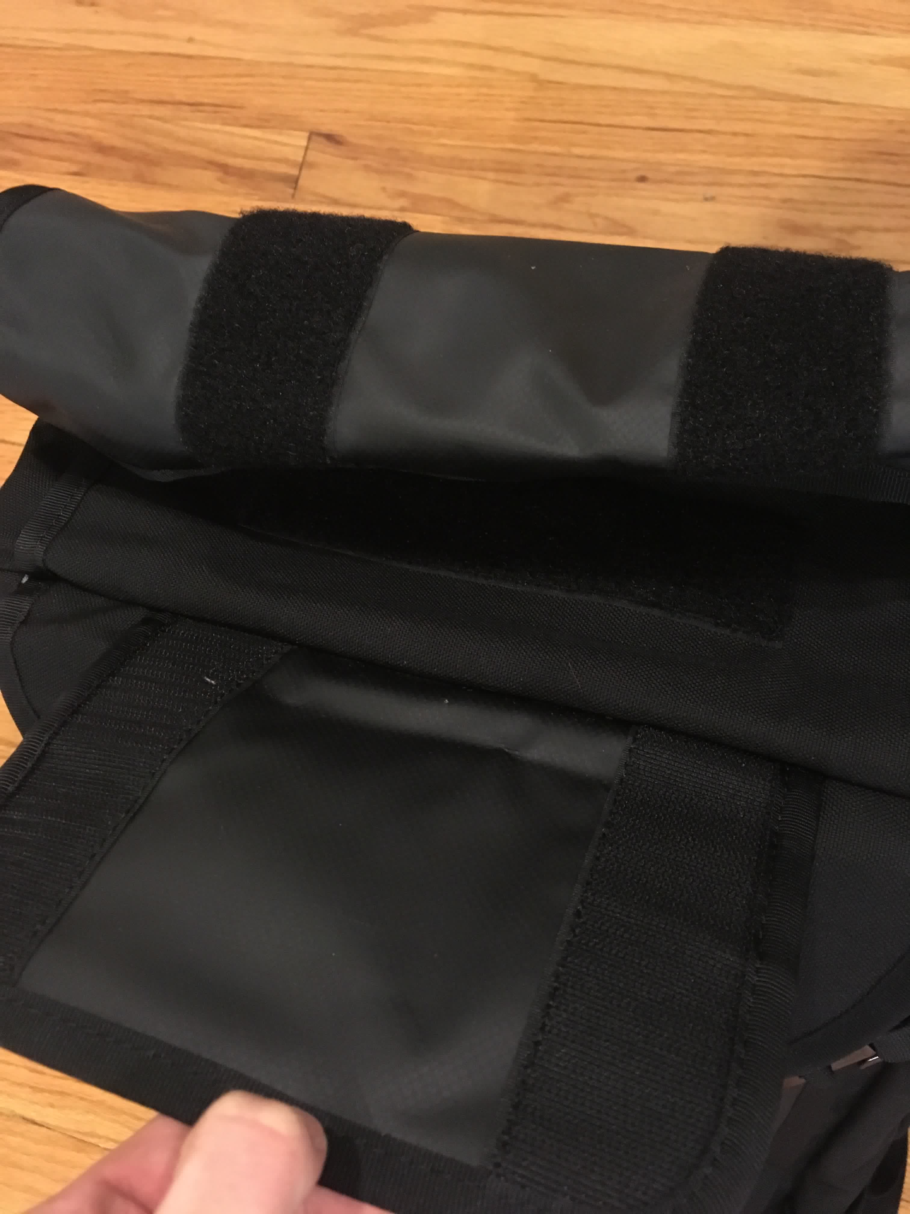 The velcro is strong, and the only way to close the rolltop flap