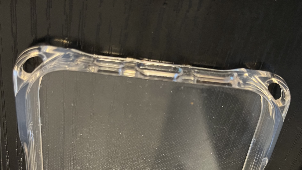 Photograph of the bottom attachment points of the phone case